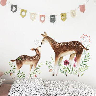 Mamá y bebe ciervos